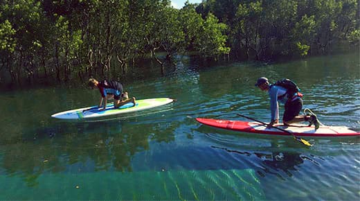 Jervis Bay Kayaks: people on private stand up paddle lesson tour